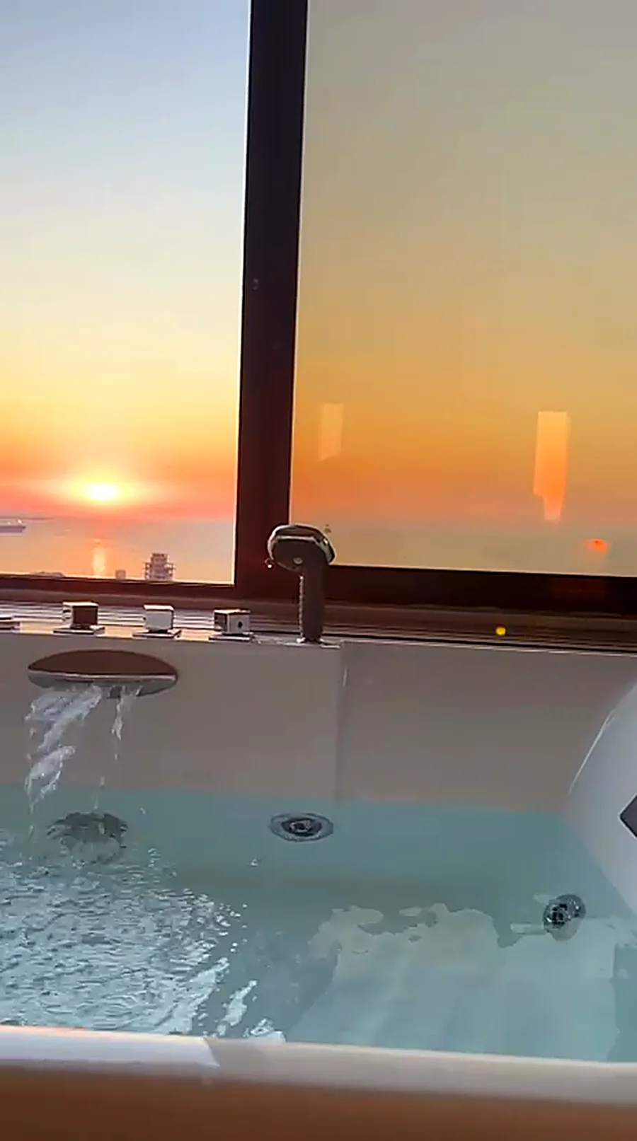 The sun setting into the Mediterranean from the NL SPA jacuzzi